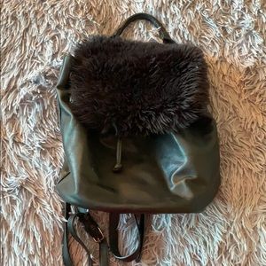 Black medium sized clasp backpack
